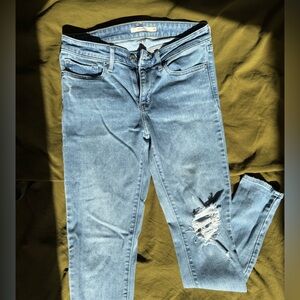 LEVIS 711 SKINNY/ Light Blue Distressed Jeans